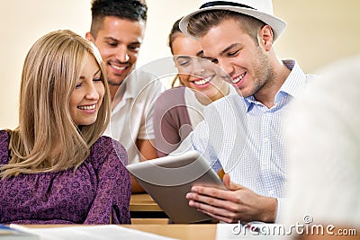 College students with tablet together