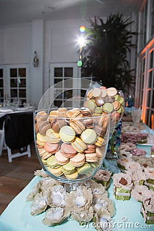 Colored Cakes in Glass Containers at Banquet