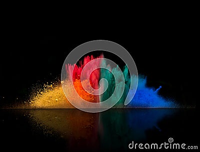 Colored dust explosion on black background