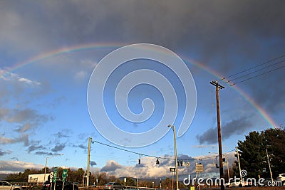 Colorful arc of rainbow over route 87 after bad storms,Queensbury,New York,2013