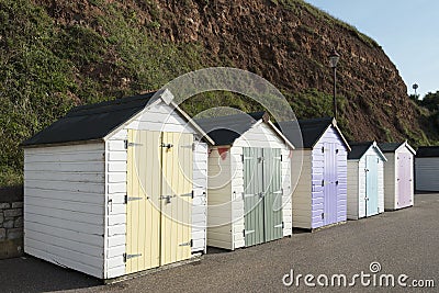 Colorful Beach Huts at Seaton, Devon, UK.