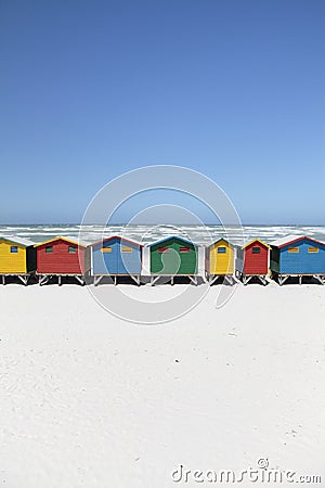 Colorful Beach Huts on White Sandy Beach