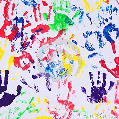 Colorful handprints on the white background