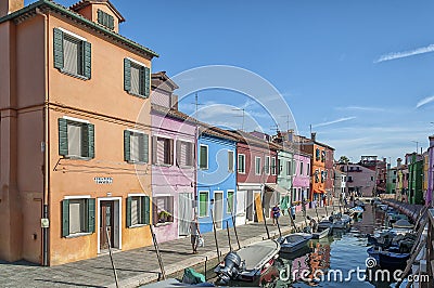 Colorful houses and canal on Burano island, near Venice, Italy.