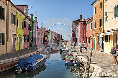 Colorful houses and canal on Burano island, near Venice, Italy.