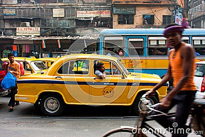 Colorful indian taxi cab stuck in a traffic jam