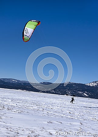 Colorful kite boarder.