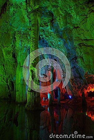 Colorful lighting on a stalactite column