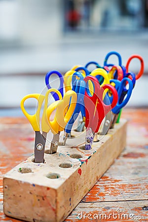 Colorful scissors for children for making art, closeup.