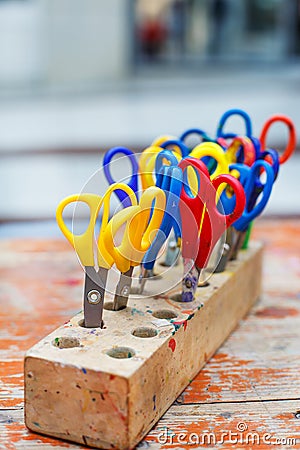 Colorful scissors for children for making art, closeup.