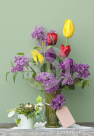Colorful Spring Tulips and Lilac in a Vase