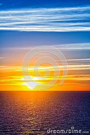 Colorful sunset over sea water