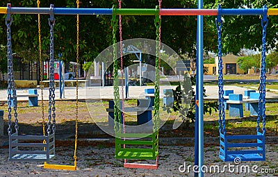 Colorful swing chairs playground children
