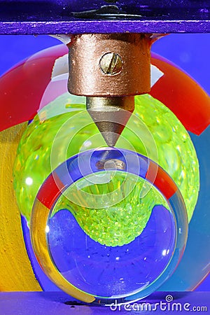 Colourful balls under pressure