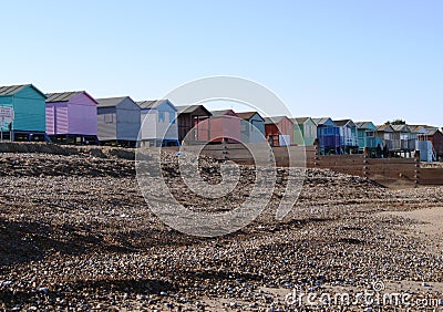 Colourful beach huts on English beach