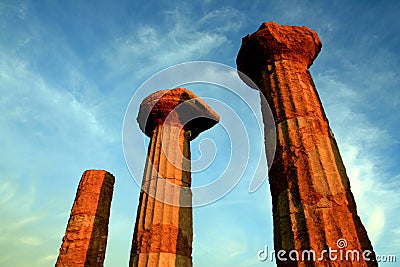 Columns top on blue electric sky. Agrigento Sicily