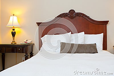 Comfy bedroom with dark wood