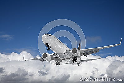 Commercial Aircraft Over Blue Sky and Cumulus