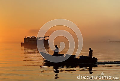 Commercial Fishermen at Sunset