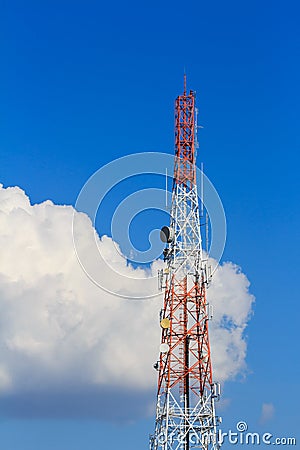 Communication tower on blue sky and clouds