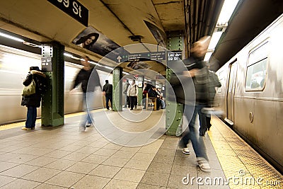 Commuter passengers in subway station