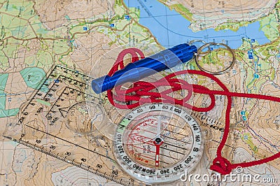 Compass on Map and Rescue Whistle