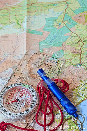 Compass on Map and Rescue Whistle