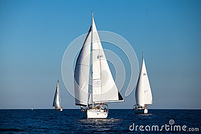 Competitors boats during of sailing regatta