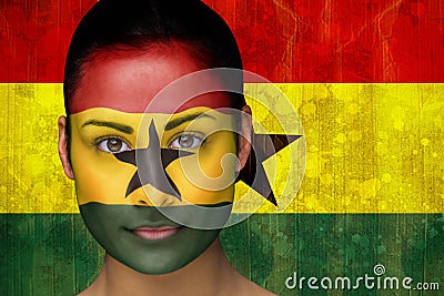 Composite image of beautiful football fan in face paint