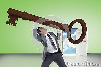 Composite image of unsmiling businessman lifting key