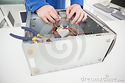 Computer engineer working on broken cables