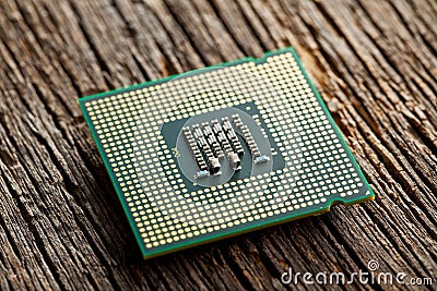 Computer processor on old wooden background