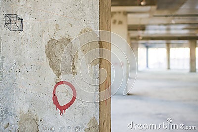 Concrete column in unfinished interior under construction