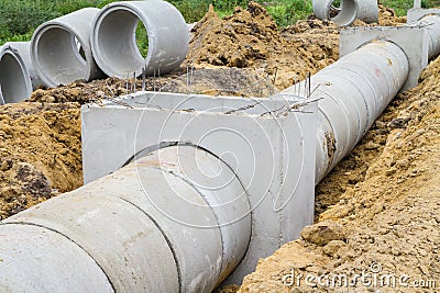 Concrete drainage pipe and manhole under construction