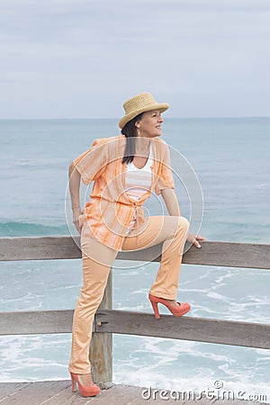 Confident attractive friendly woman beach