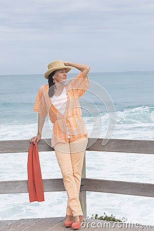 Confident attractive relaxed woman beach