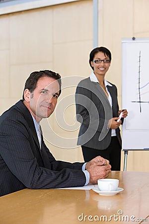 Confident business woman giving presentation
