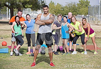 Confident Instructor with Fitness Class