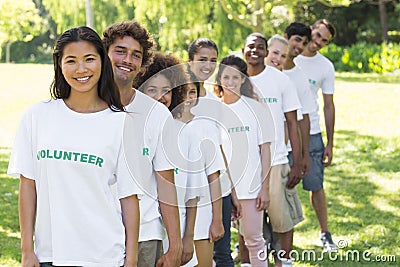 Confident volunteers standing in a line