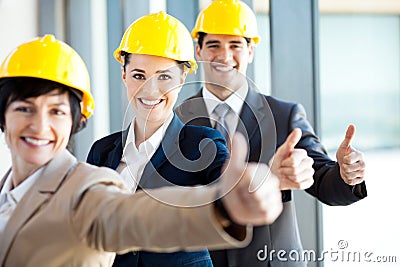 Construction managers thumbs up