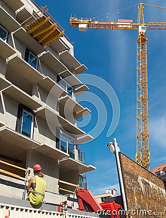 Construction site with a female construction worker.