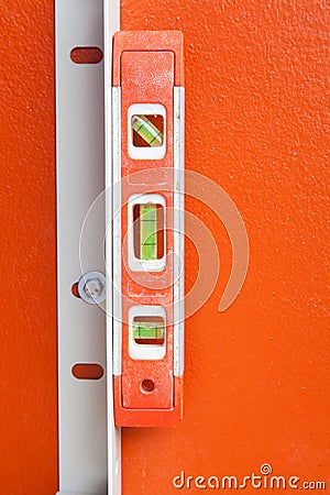 Construction Water Level on orange wall
