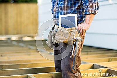 Construction Worker With Tablet Computer And