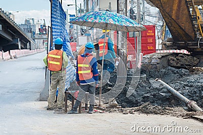 Construction workers working in site bridge piling