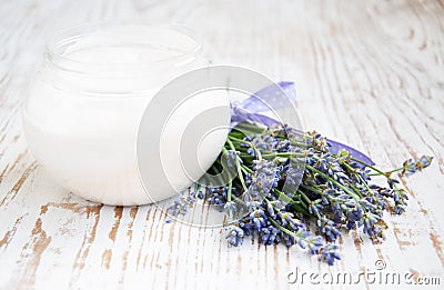 Container with cream and lavender