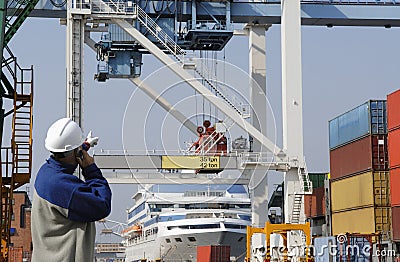 Container port, workers, cranes and trucks