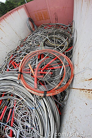 Containers full of electric cables for recyclable waste