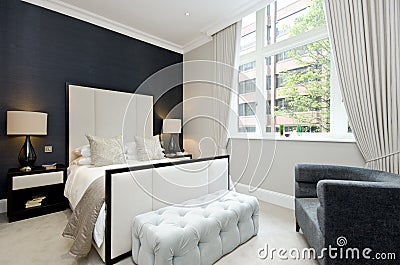 Contemporary bedroom with king size bed with luxury designer fur