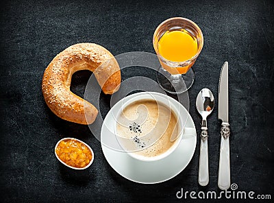 Continental breakfast on black chalkboard