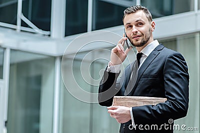 Conversation with the client. Confident businessman in formal co